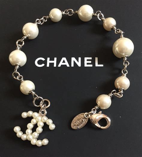 silver chanel charm bracelet|chanel bracelet price.